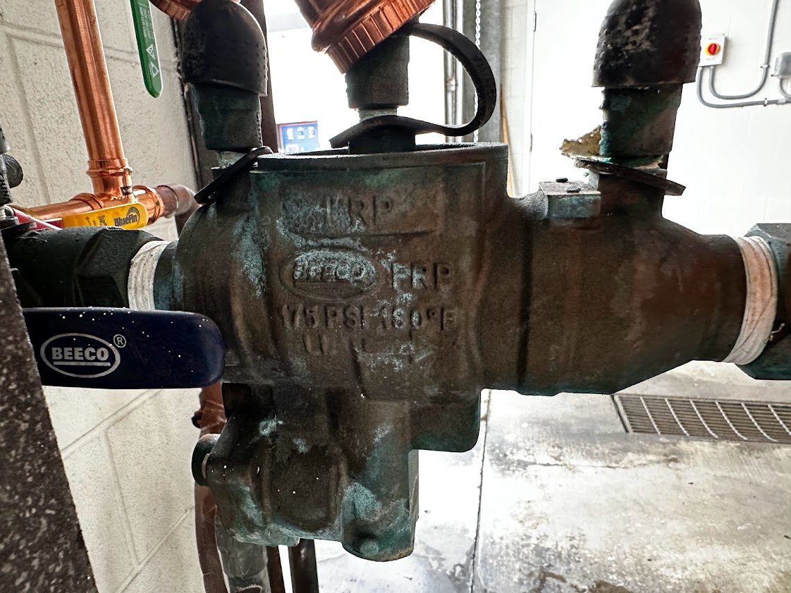 Beeco RP backflow preventer on a commercial line, 175 PSI and 180 degrees F cast into the body