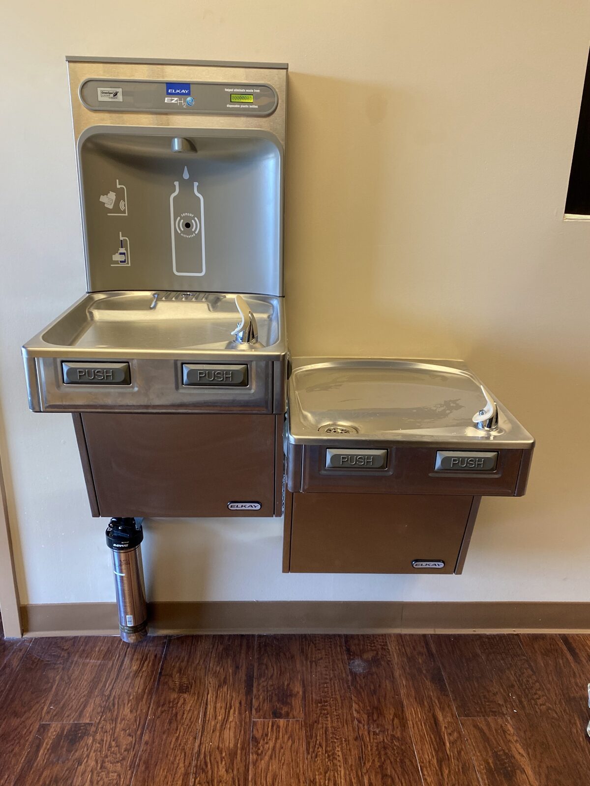 Elkay bi-level drinking fountain with bottle filler installed in a church gym in Baytown, TX
