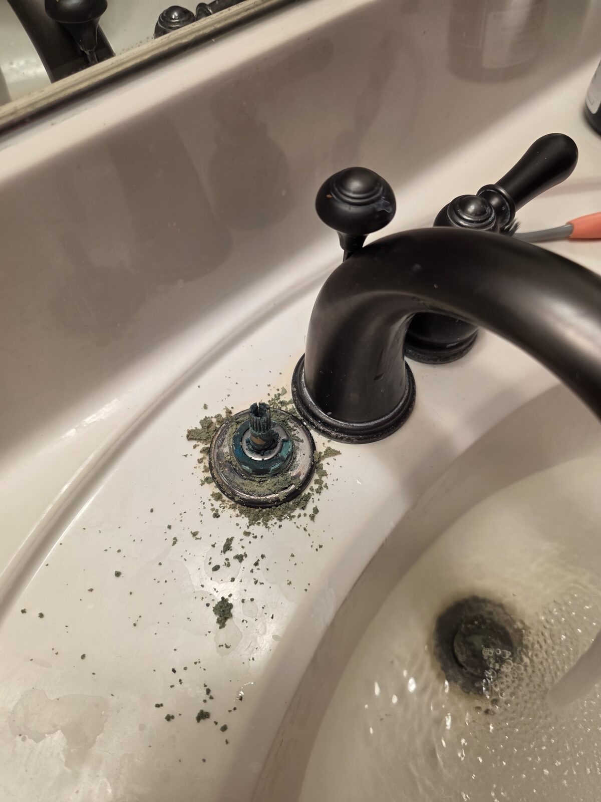 Sediment and debris removed from a faucet