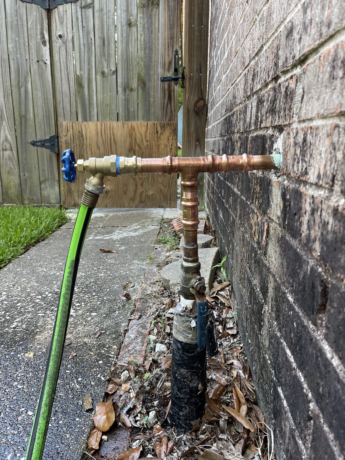 New copper hose bib finished at the wall