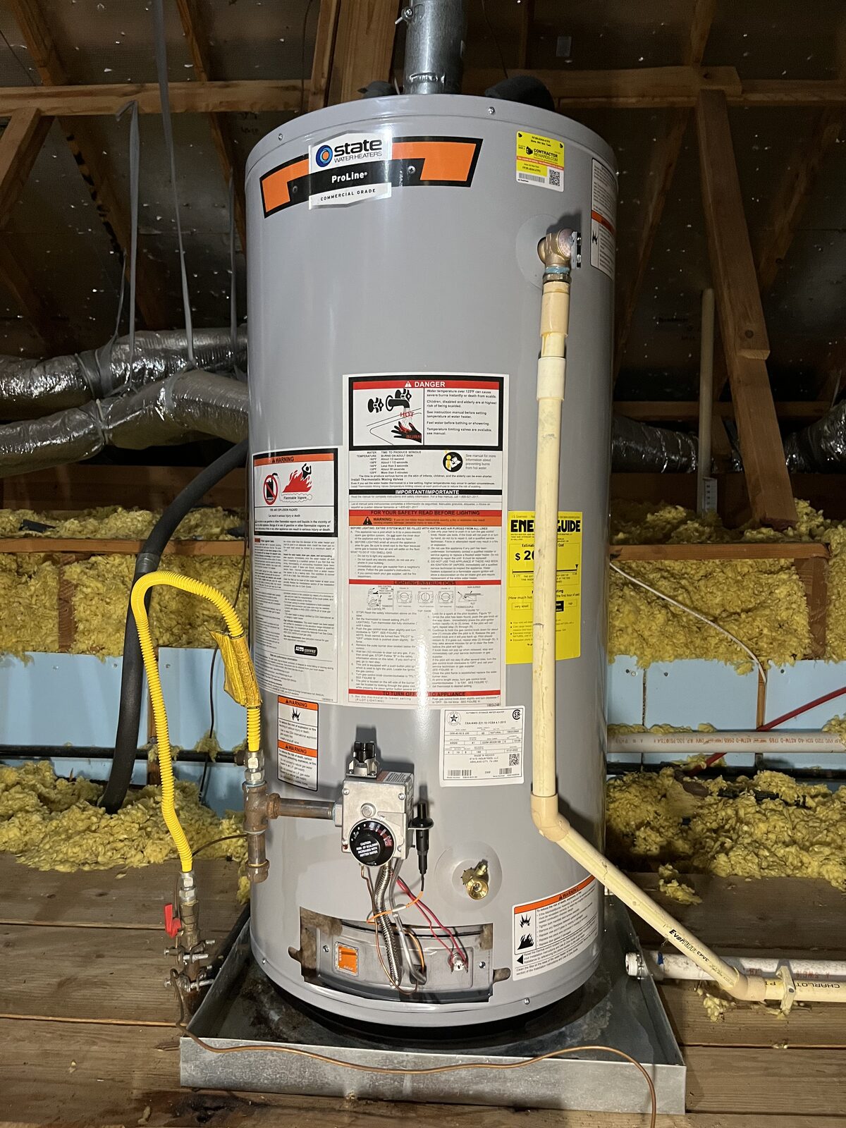 State ProLine 40 gallon short gas water heater installed in an attic with a new drip pan
