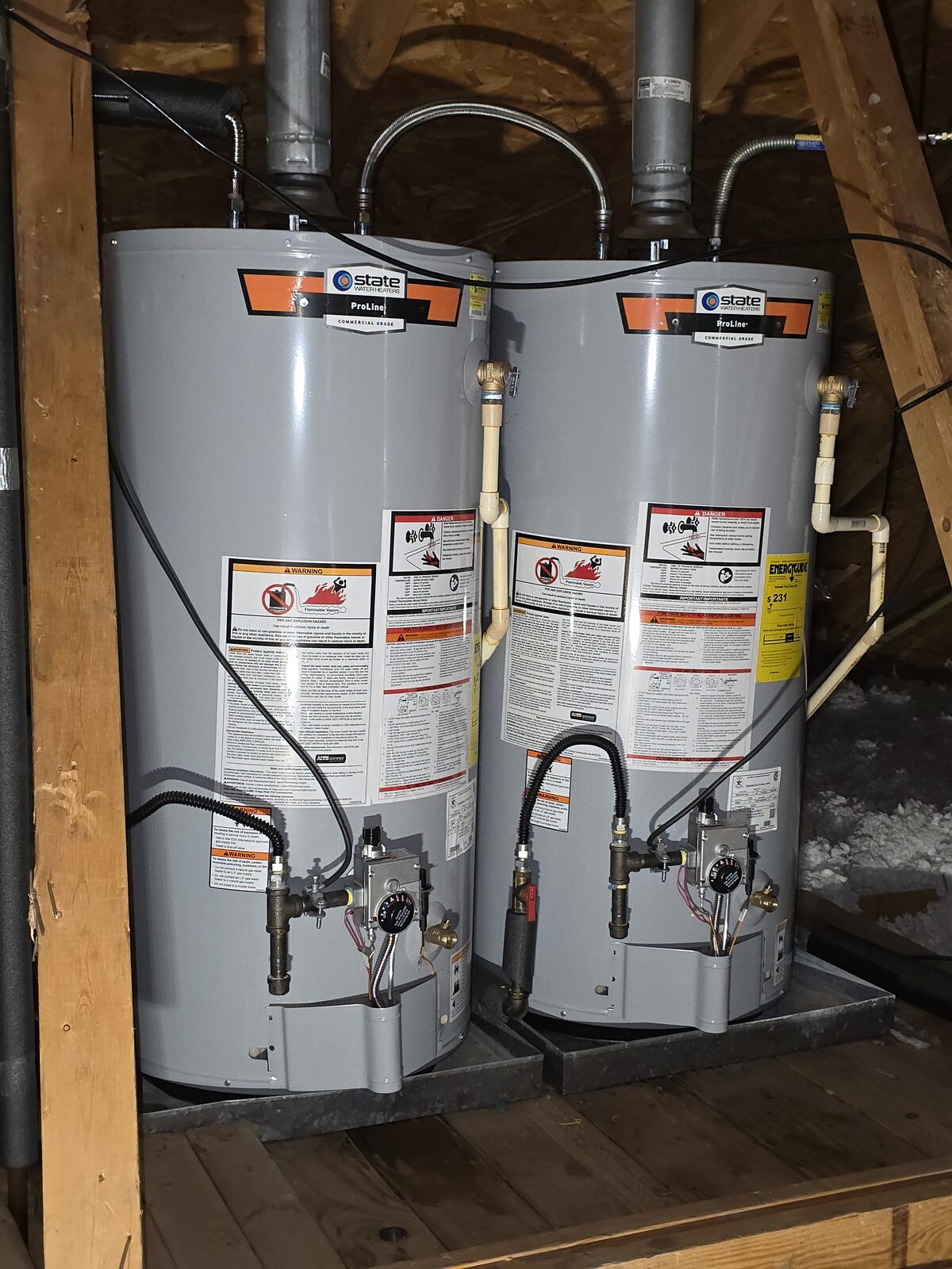 Two State ProLine water heaters installed in an attic in Mont Belvieu, TX